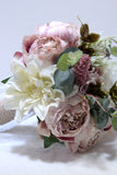 Blush Wedding Handing Flowers